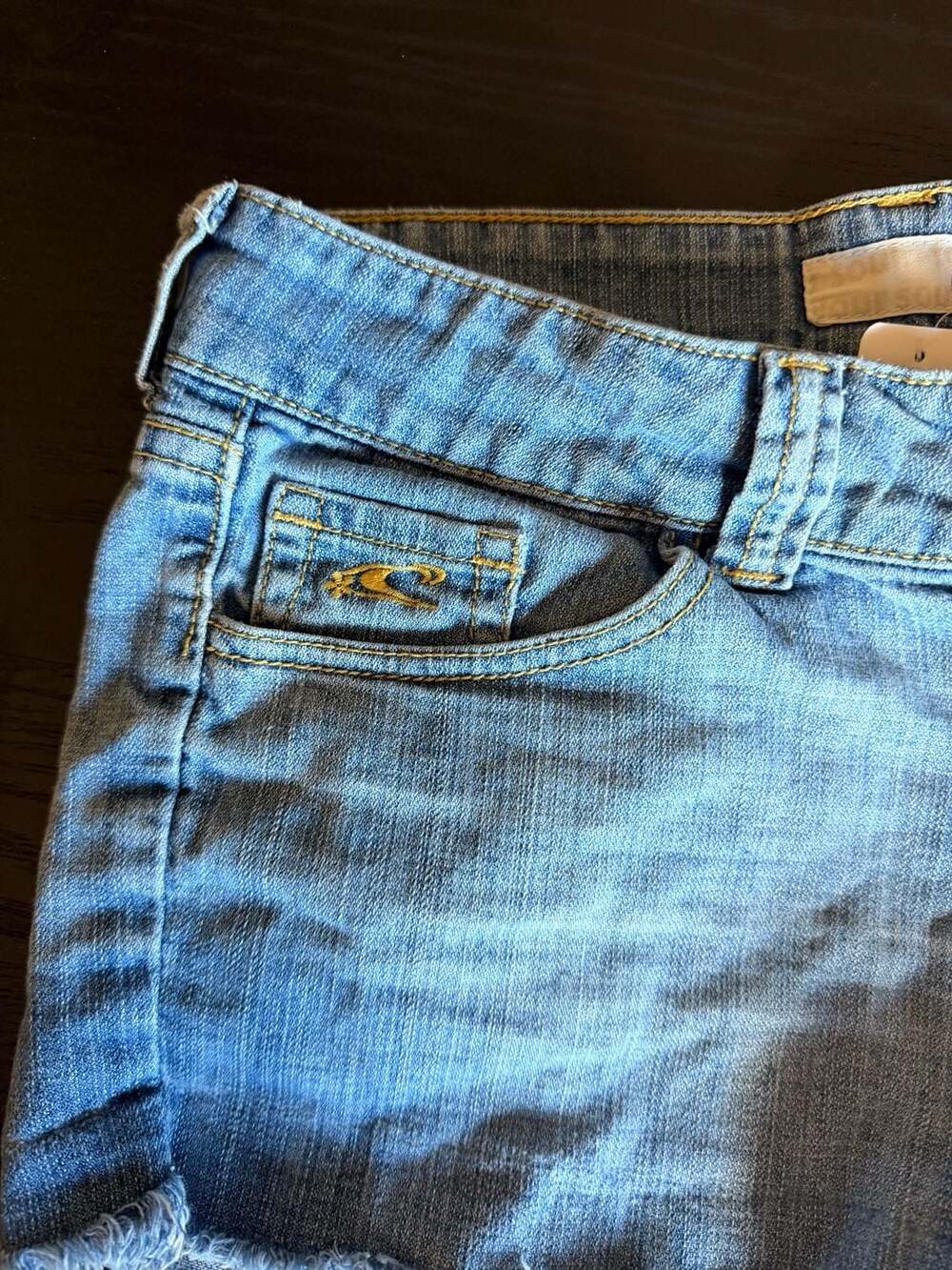 O'Neill Low Rise Cut Off Raw Hem Denim Micro Shorts with Palm Tree Patch - Picture 5 of 8